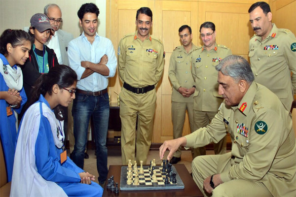 Army Chief General Bajwa plays chess with a talented student